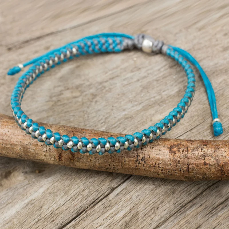 Gold-plated charm bracelets for teens-Blue Grey Progression Hand Knotted Macrame Bracelet with Hill Tribe Silver Beads