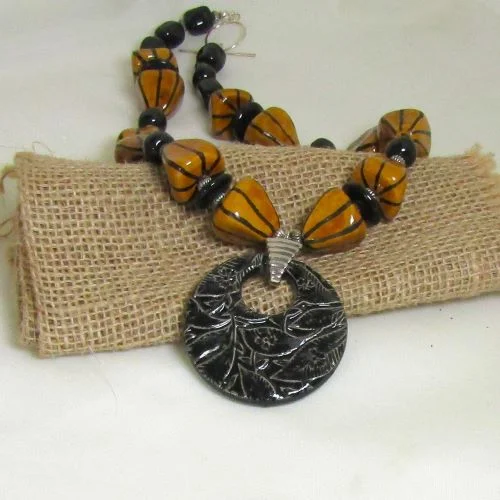 women’s long beaded necklace-Honey and Black Kazuri Warrior Necklace with Fair Trade Pendant