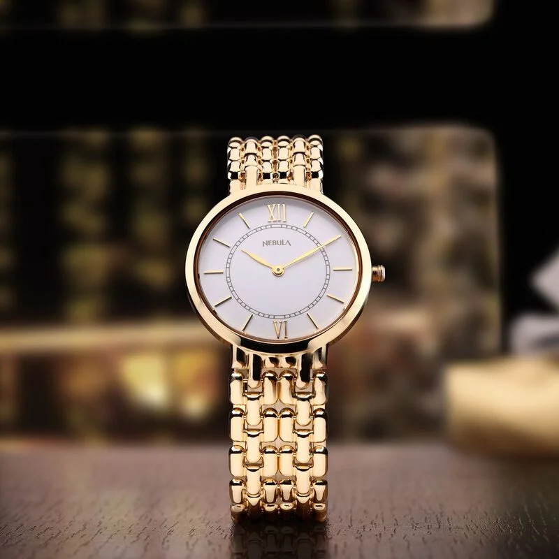 trendy watches for women with sleek bands -Titan Nebula Quartz Analog 18 Karat Solid Gold Watch For Men